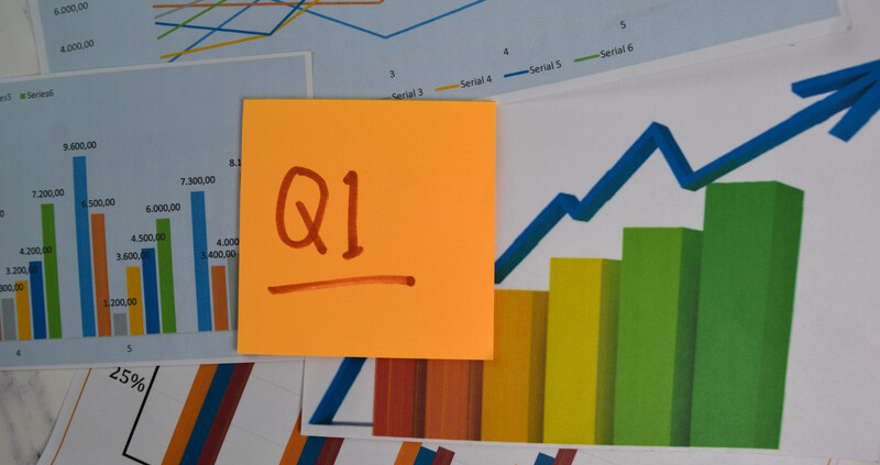 q1 on post it note with graphs and charts_canstockphoto84101914 800x533