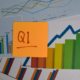 q1 on post it note with graphs and charts_canstockphoto84101914 800x533