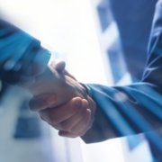 businessmen shaking hands_shutterstock_2249889569 800x533