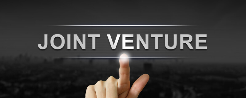 finger pointing at words joint venture_canstockphoto42416008-2 800x533
