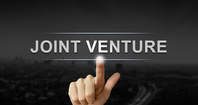 finger pointing at words joint venture_canstockphoto42416008-2 800x533