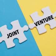 joint venture graphic_JOINT VENTURE word alphabet letters on puzzle_shutterstock_2500442725 800×533 joint venture graphic_JOINT VENTURE word alphabet letters on puzzle_shutterstock_2500442725 800x533